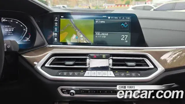 BMW X5 2022 — ფოტო 15/31
