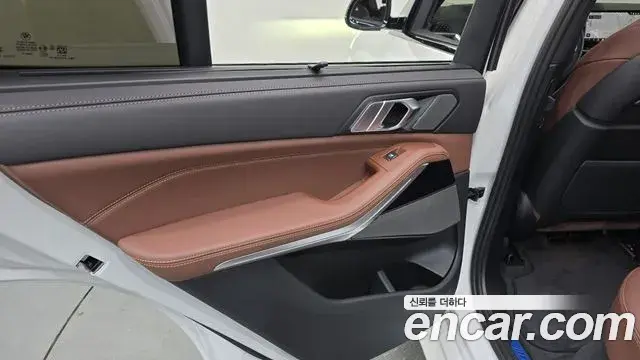 BMW X5 2025 — ფოტო 32/35