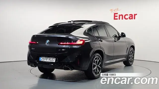 BMW X4 2022 — Фото 2/20