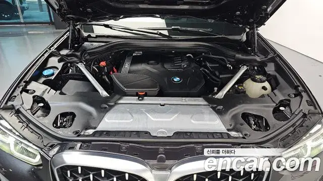 BMW X4 2022 — Фото 6/20