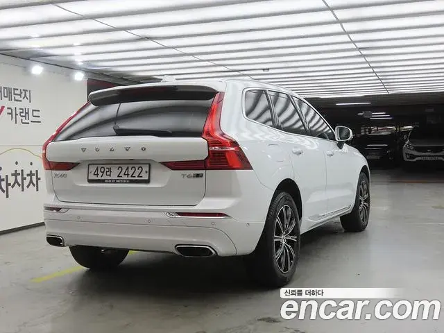 Volvo XC60 2018 — ფოტო 7/20