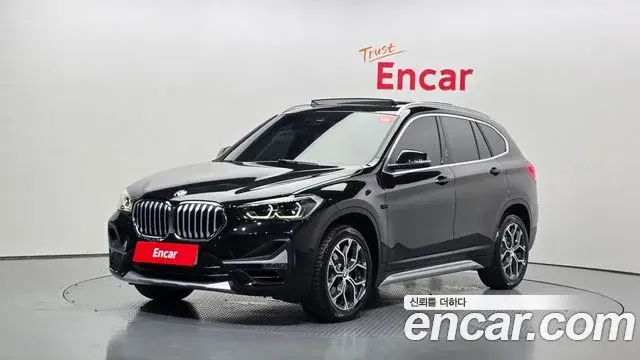 BMW X1 2021 — Фото 1/20