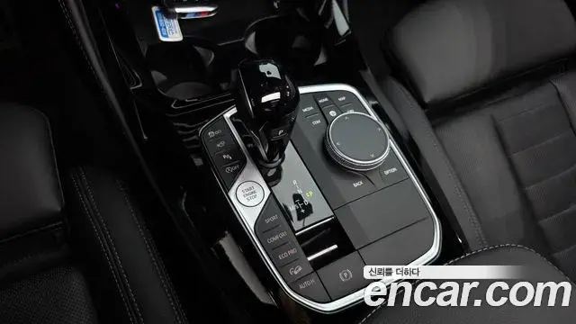 BMW X4 2023 — ფოტო 15/20