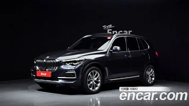 BMW X5 2019 — Фото 1/20