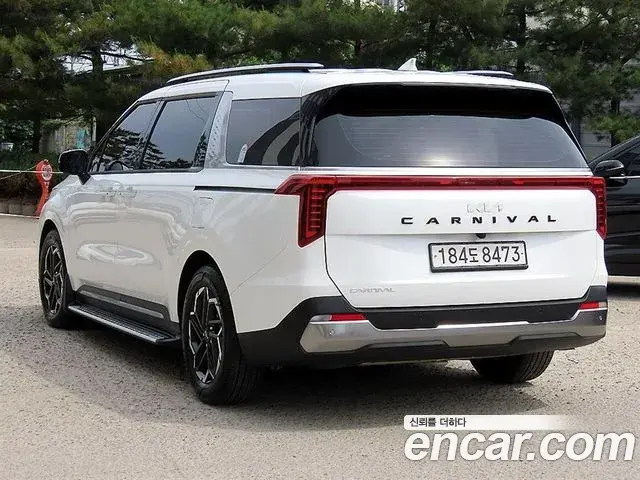 Kia Carnival 2023 — Фото 2/20