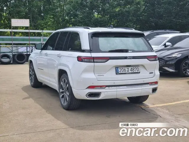 Jeep Grand Cherokee 2023 — Фото 1/20