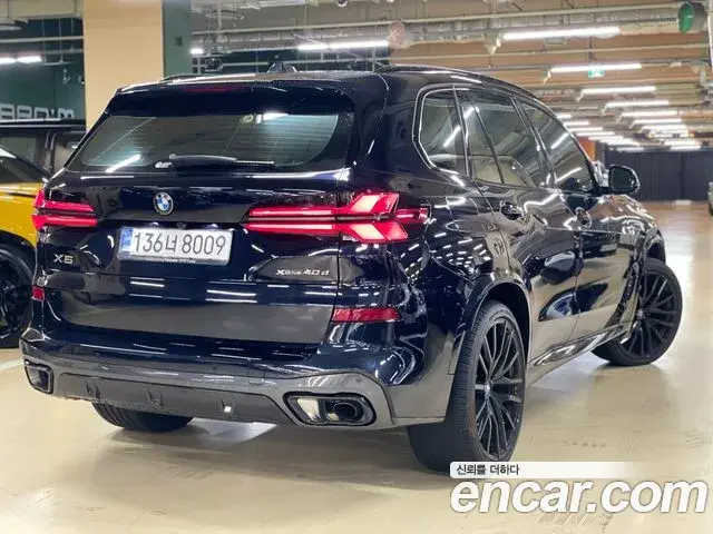 BMW X5 2025 — ფოტო 15/19