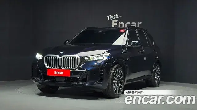 BMW X5 2023 — Фото 1/20