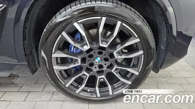 BMW X5 2023 — ფოტო 23/33