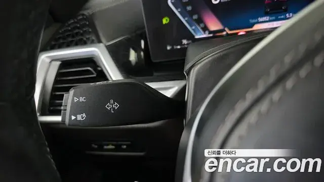 BMW X5 2023 — ფოტო 26/33