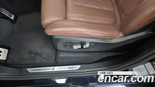 BMW X5 2023 — ფოტო 27/33