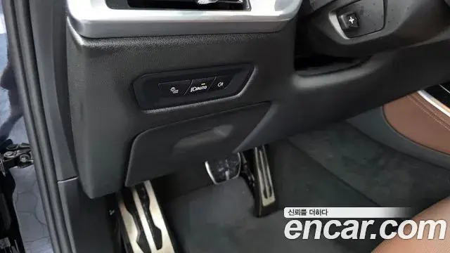 BMW X5 2023 — ფოტო 10/33