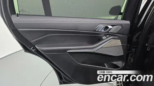 BMW X7 2024 — ფოტო 31/34