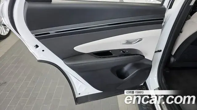 Hyundai Tucson Hybrid 2023 — ფოტო 7/34