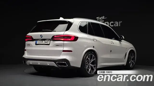 BMW X5 2021 — Фото 1/20