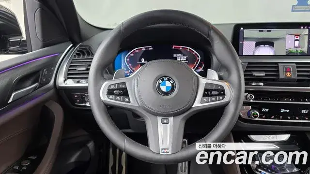 BMW X4 2021 — Фото 12/20