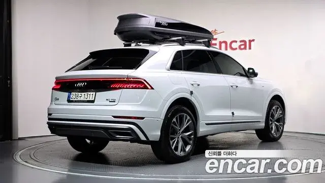 Audi Q7 2021 — Фото 2/20
