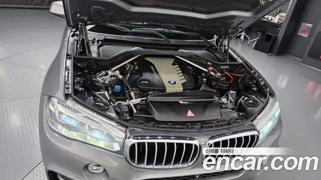 BMW X6 2018 — Фото 6/20