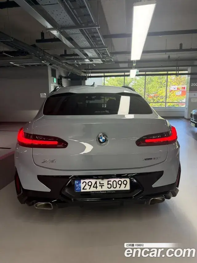 BMW X4 2024 — Фото 2/8