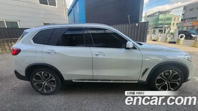 BMW X5 2021 — Фото 2/11