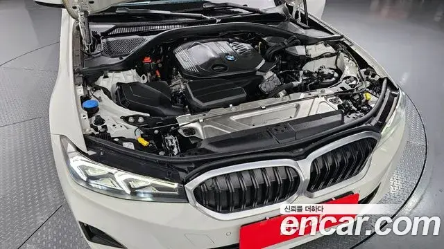 BMW 3 Series 2023 — ფოტო 19/20