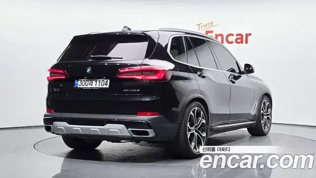 BMW X5 2022 — ფოტო 6/20