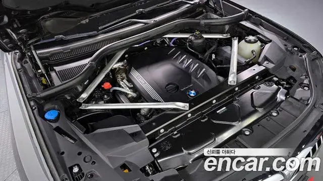 BMW X5 2022 — ფოტო 7/20