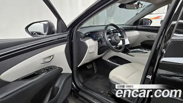 Hyundai Tucson Hybrid 2021 — ფოტო 2/20