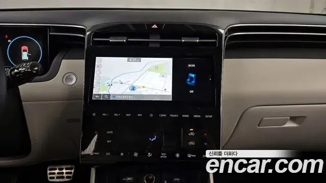 Hyundai Tucson Hybrid 2021 — ფოტო 9/20