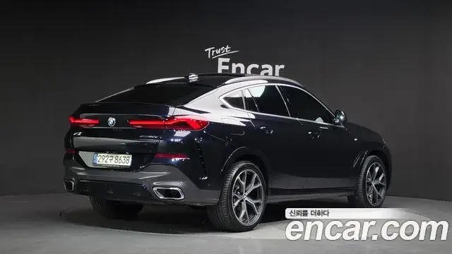 BMW X6 2021 — Фото 1/20