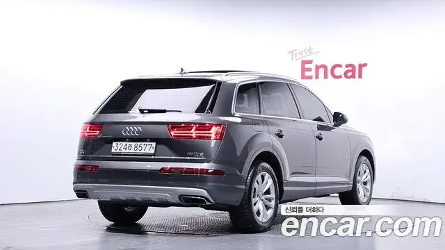 Audi Q7 2019 — Фото 2/20