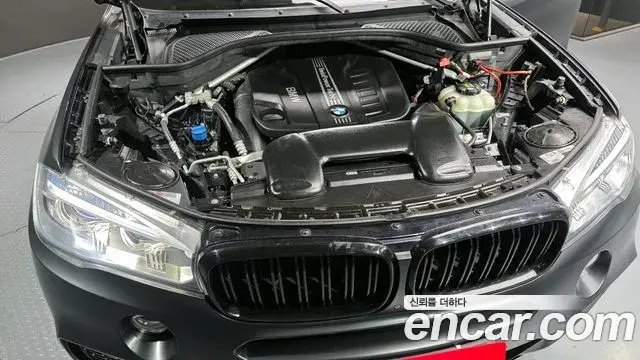 BMW X5 2018 — ფოტო 16/20