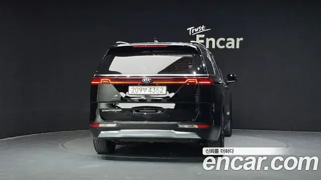 Kia Carnival 2021 — ფოტო 1/20