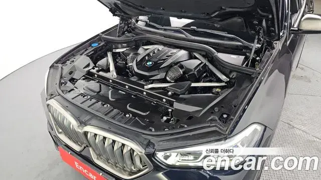 BMW X6 2021 — ფოტო 11/20