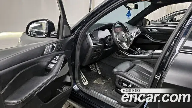 BMW X7 2019 — ფოტო 7/20