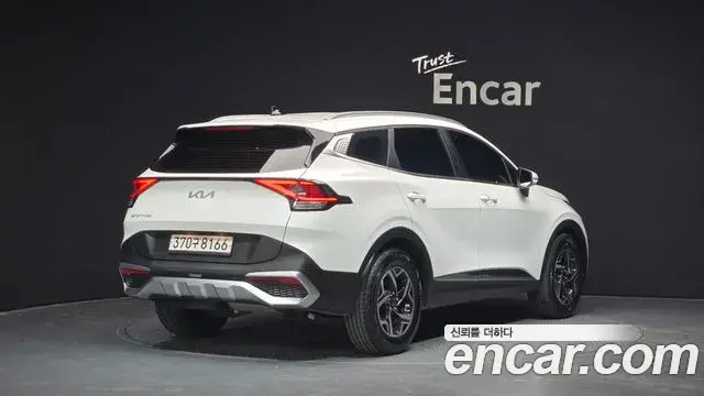 Kia Sportage 2021 — Фото 2/20