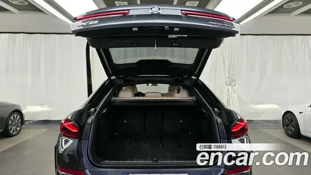 BMW X6 2021 — ფოტო 14/20
