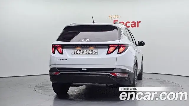 Hyundai Tucson Hybrid 2021 — ფოტო 9/20