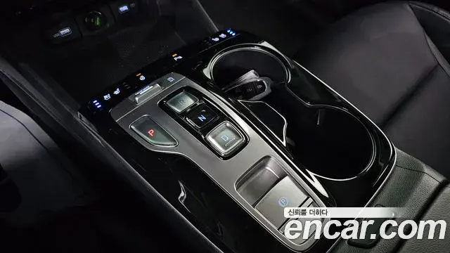 Hyundai Tucson Hybrid 2021 — ფოტო 8/20