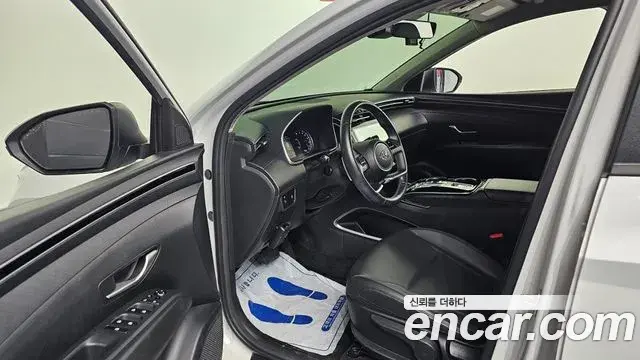 Hyundai Tucson Hybrid 2021 — ფოტო 18/20