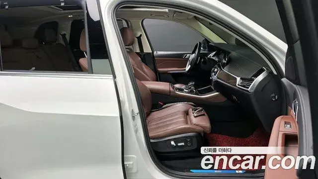 BMW X5 2022 — ფოტო 15/20