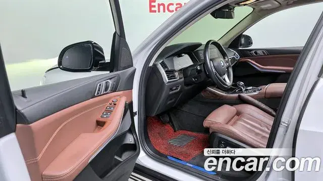 BMW X5 2022 — ფოტო 8/20