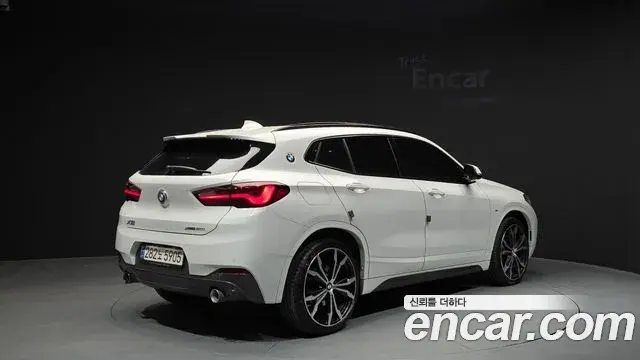 BMW X2 2023 — ფოტო 8/15