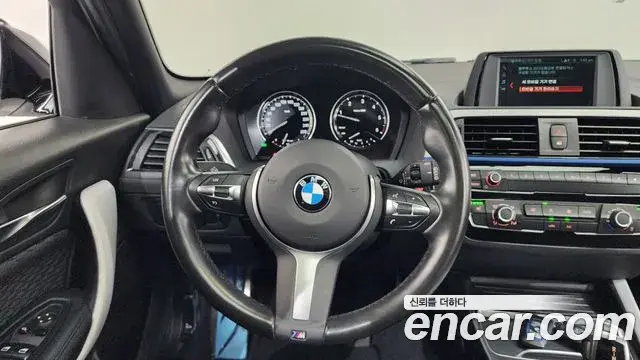 BMW 1 Series 2018 — Фото 13/20