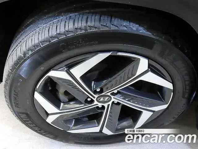 Hyundai Tucson Hybrid 2022 — ფოტო 11/20