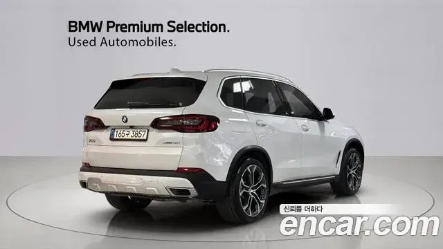 BMW X5 2022 — ფოტო 15/20