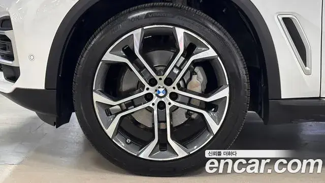 BMW X5 2022 — ფოტო 14/20