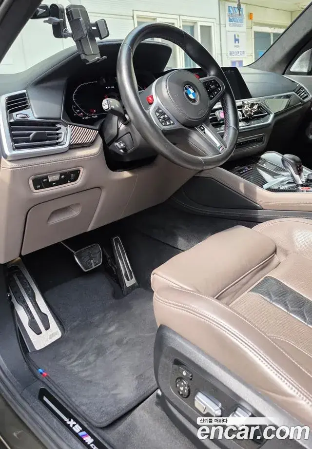BMW X5M 2022 — ფოტო 7/15