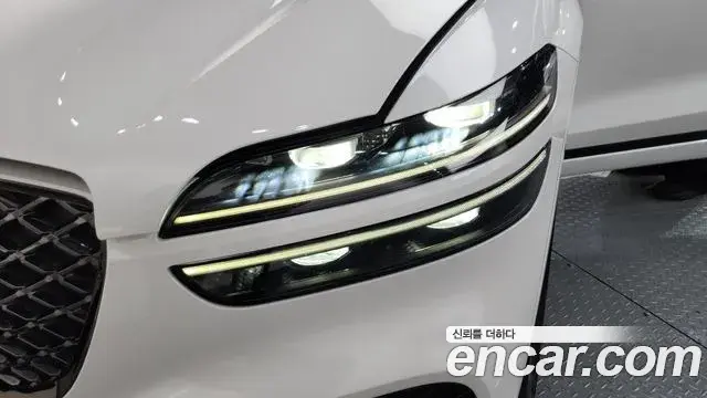 Genesis GV70 2021 — ფოტო 31/39