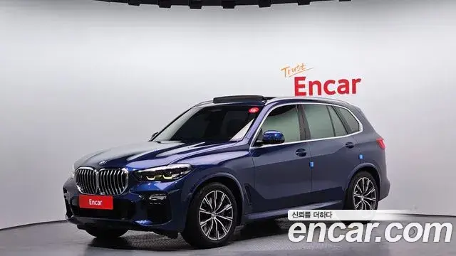 BMW X5 2019 — Фото 1/20